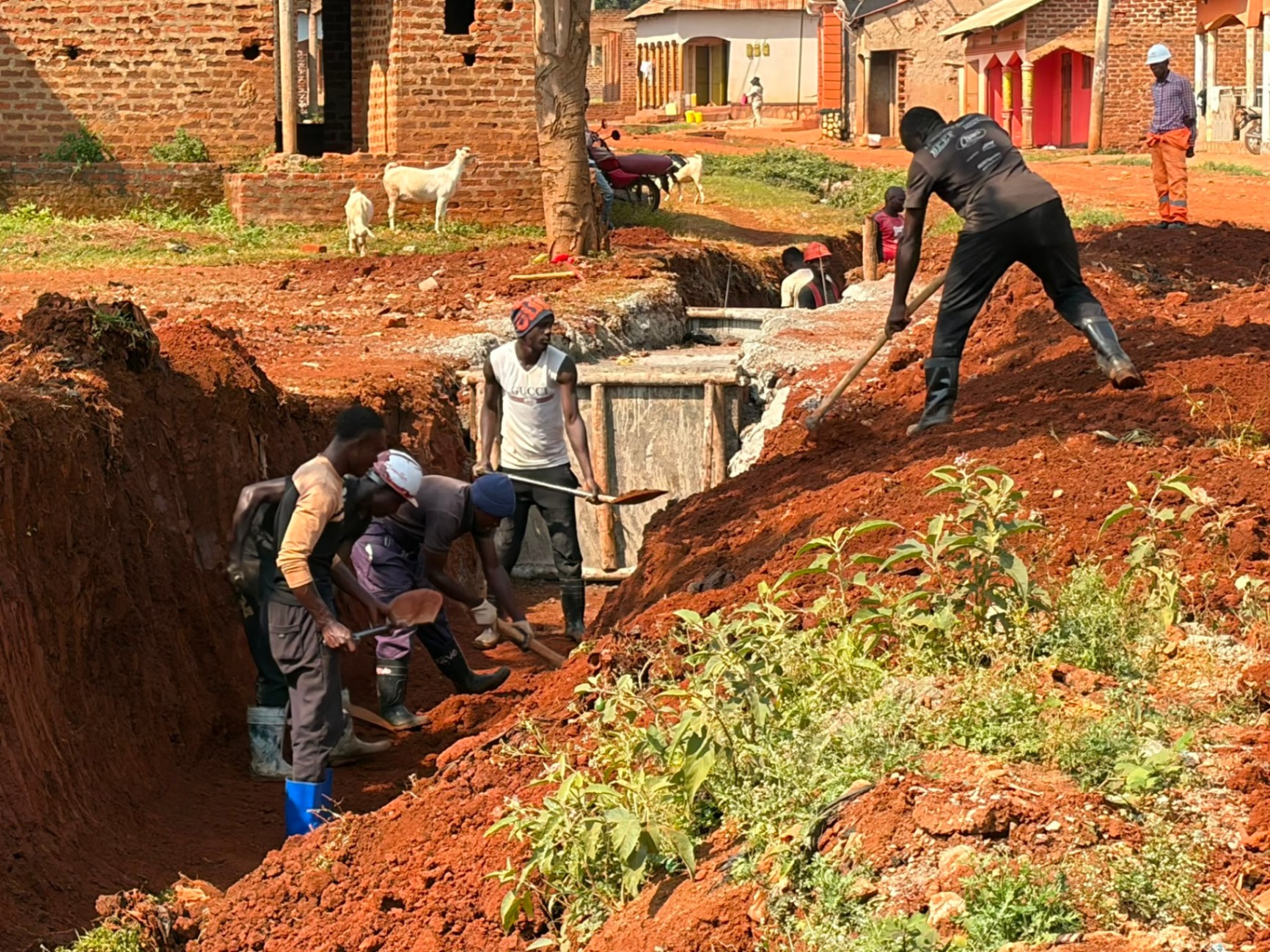 Burlcore water well construction in Mawero, Busia: Community trench works